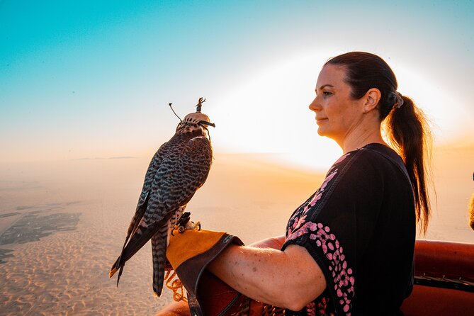 Adventure Hot Air Balloon with Buffet Breakfast & Falcon Show - A falcon in flight beside the balloon