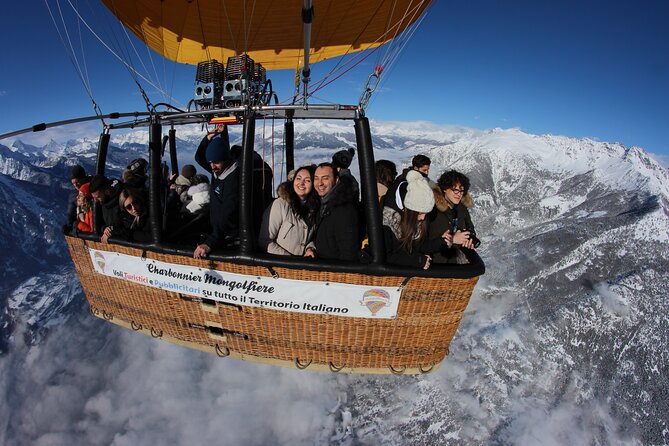 Aosta hot air balloon flight over the Alps with breathtaking views - Landing, photos, and the final drink