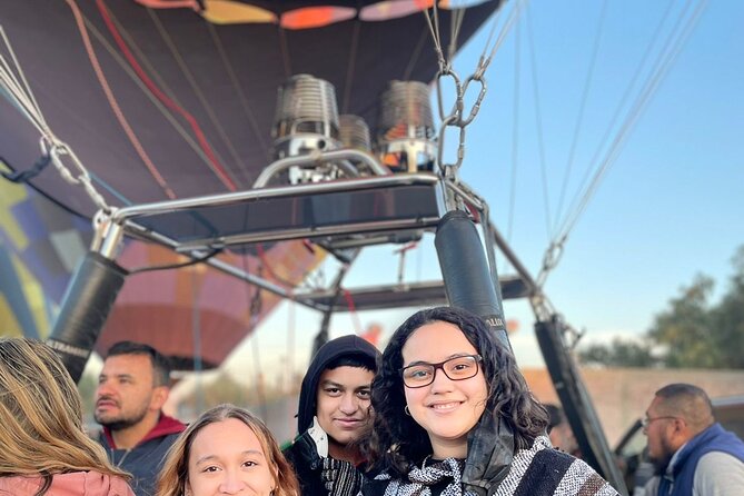Balloon flight with private transportation and guided tour to Teotihuacán - Coffee, balloon inflation, and the launch setup