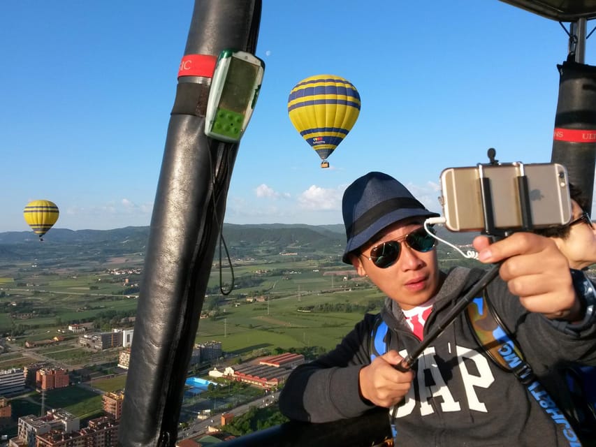 Barcelona: Hot Air Balloon Ride with Optional Transportation - Landing, packing up, and the Cava toast