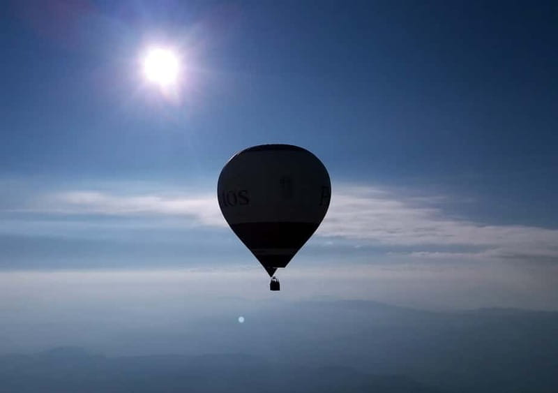 Barcelona Private VIP Balloon Flight with Pick-up Service - Landing in the countryside and raising a glass of cava