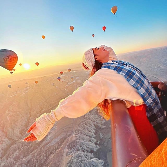 Cappadocia: Göreme Sunrise Hot Air Balloon Flight - Sunrise over Göreme, with the valleys below