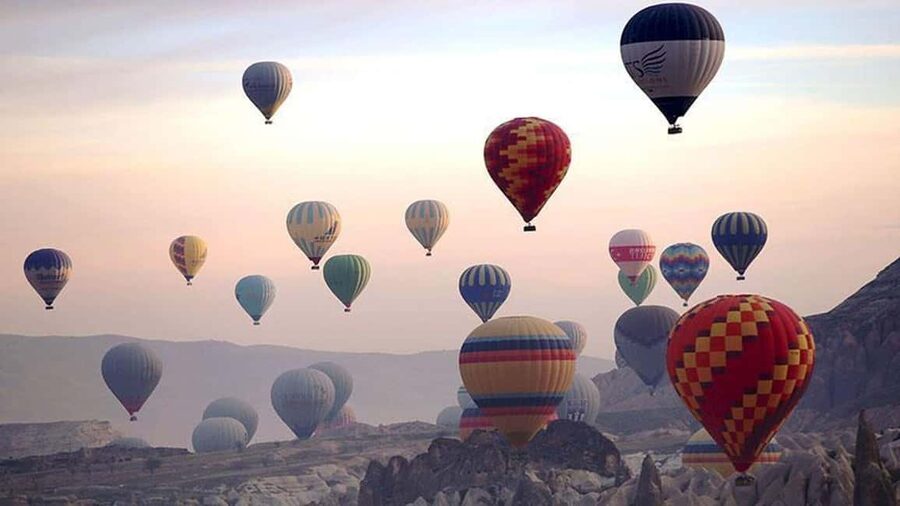 Cappadocia: Hot Air Balloon Watching Tour w/Hotel Transfer - Çavuşin at dawn, where the balloons begin to glow