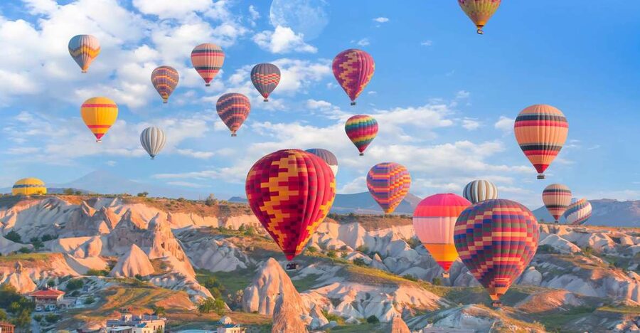 Cappadocia: Red Tour and Sunrise Balloon Tour - A sunrise above Göreme before the day begins