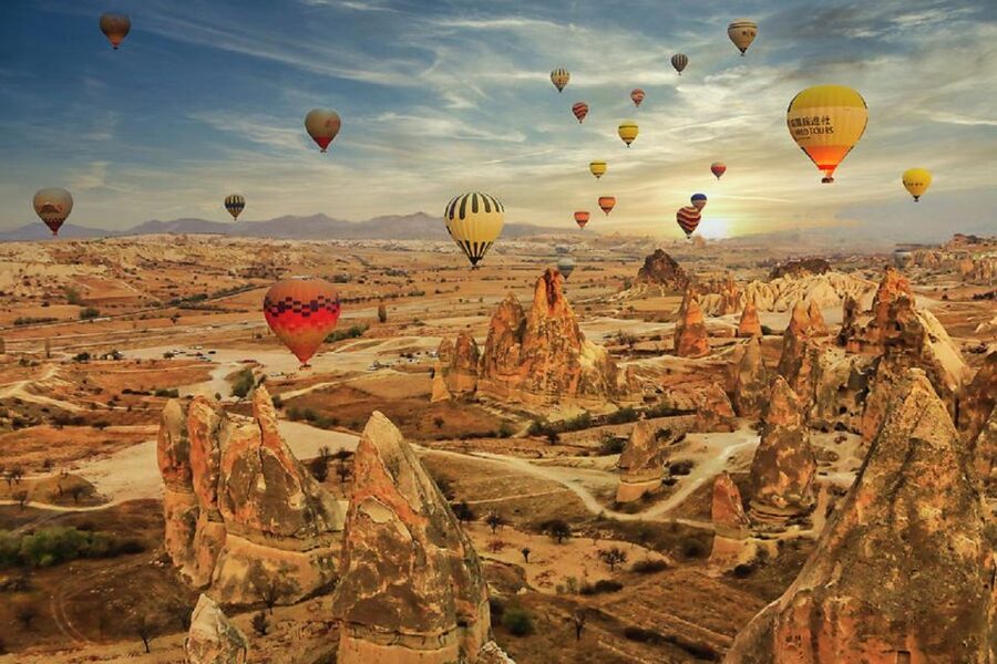 Cappadocia: Red Tour and Sunrise Balloon Tour - Uchisar Castle at the highest point