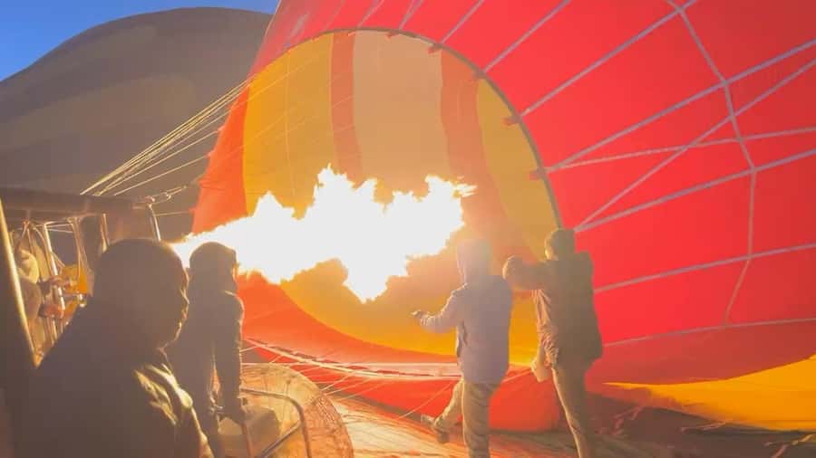 Dubai: Hot Air Balloon with Camel, ATV, & Horse Ride Options - Coffee, safety instructions, and the balloon taking shape