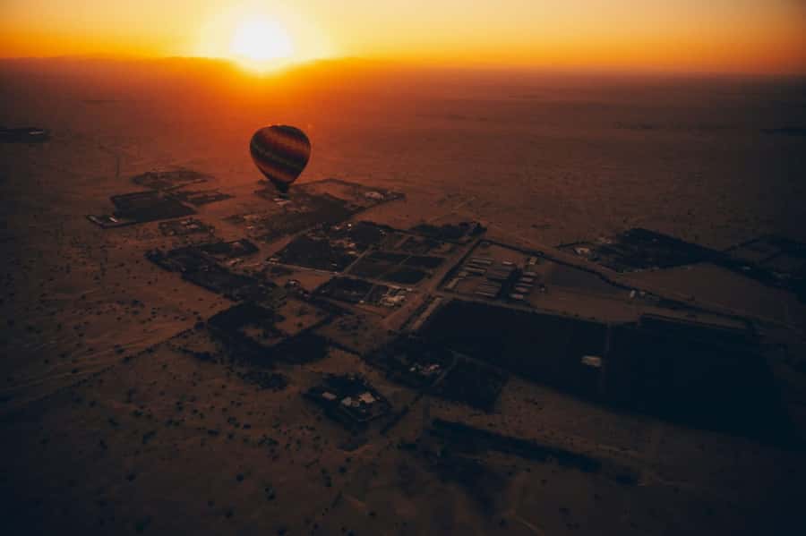 Dubai: Private Hot Air Balloon Tour Over the Dubai Desert - Rising over the dunes at sunrise