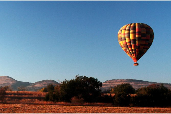 Early Morning Balloon Safari with Breakfast from Magaliesburg - Landing, drinks, and the breakfast reward