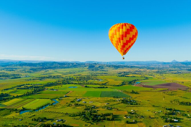 Gold Coast Hot Air Balloon + Winery Breakfast + Return Transfers - Helping pack the balloon after landing