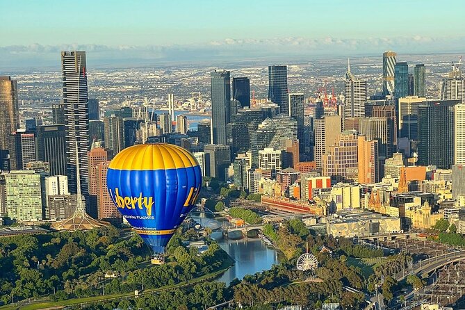 Hot Air Balloon Flights over Melbourne City (optional breakfast) - Folding the balloon away after landing