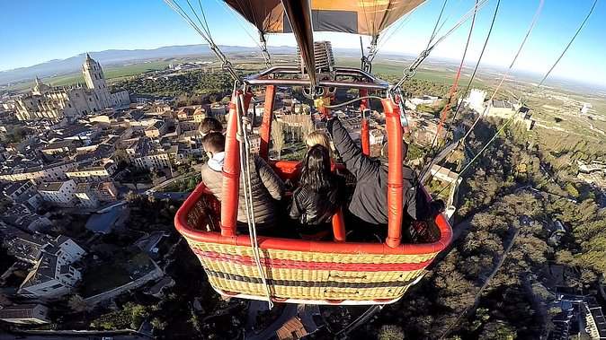Hot-Air Balloon Ride over Segovia with Optional Transport from Madrid - Floating above Segovia at sunrise