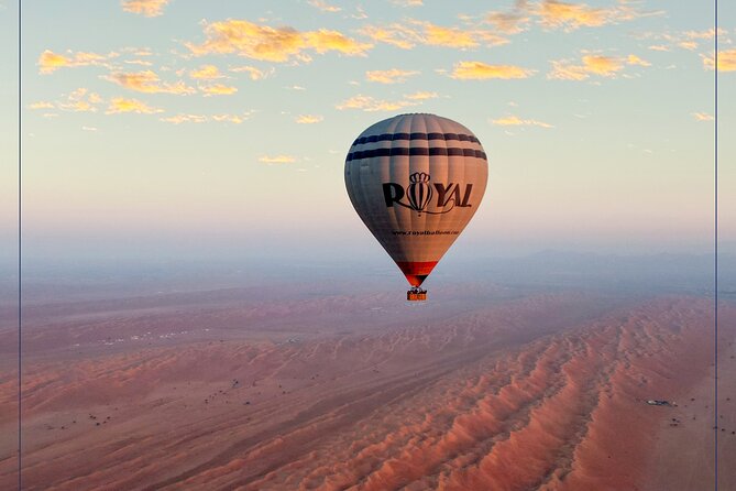 Hot Air Balloon Tour at Wahiba Sands - Landing, refreshments, and the medal