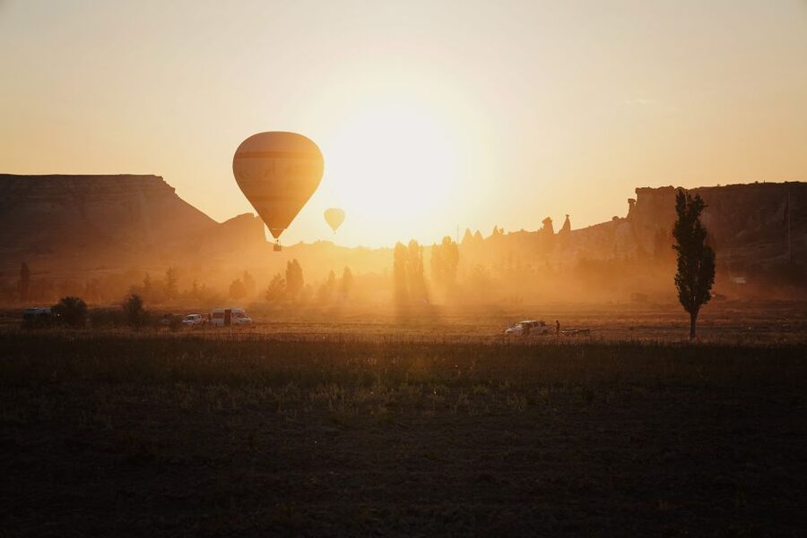 Hot air balloons in Goreme red valley - Why Cappadocia looks different from a balloon