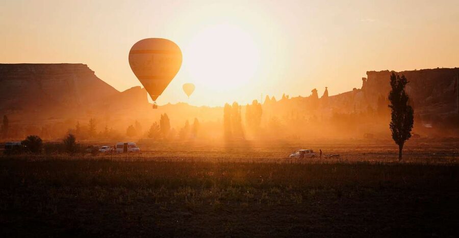 Hot air balloons in Goreme red valley - A one-hour view over Red Valley