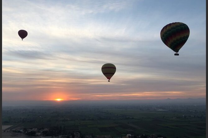 Luxury Sunrise Balloon Ride in Luxor with Hotel Pickup - Landing, certificates, and the possible Nile crossing