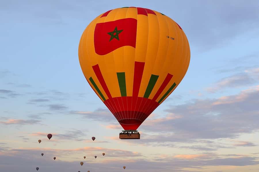Marrakech: Hot Air Balloon Flight with Berber Breakfast - Coffee, cake, and the balloon taking shape