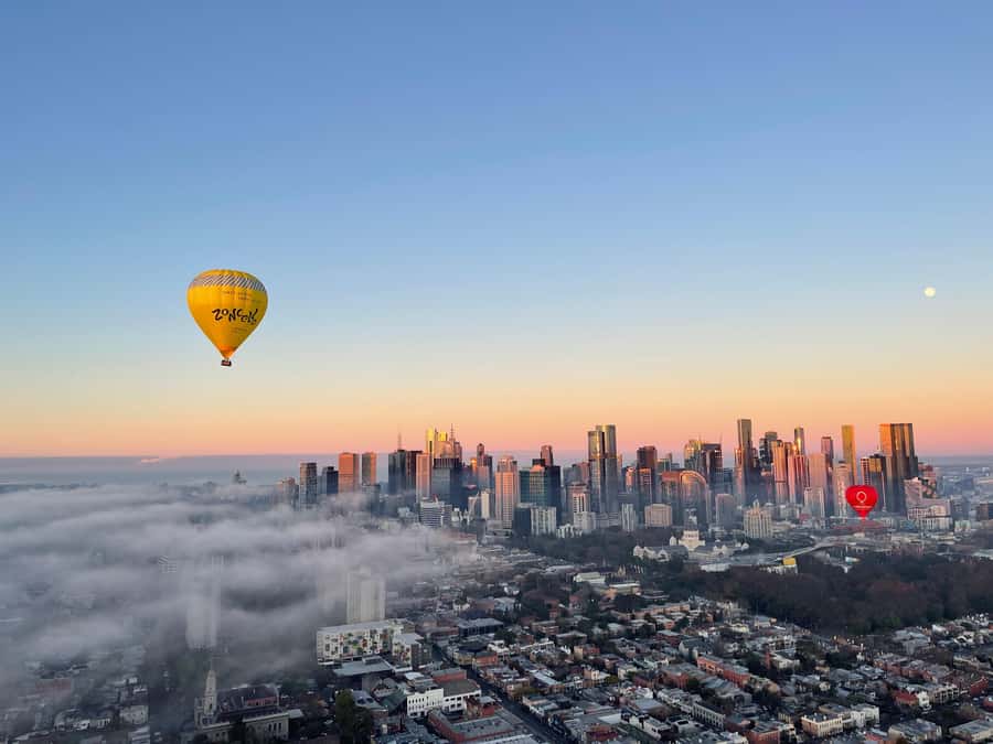 Melbourne: Sunrise Hot Air Balloon Flight - Melbourne before sunrise, from a balloon basket