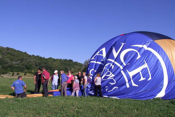 Provence Hot-Air Balloon Ride from Forcalquier - Landing, packing up, and the toast des Aéronautes