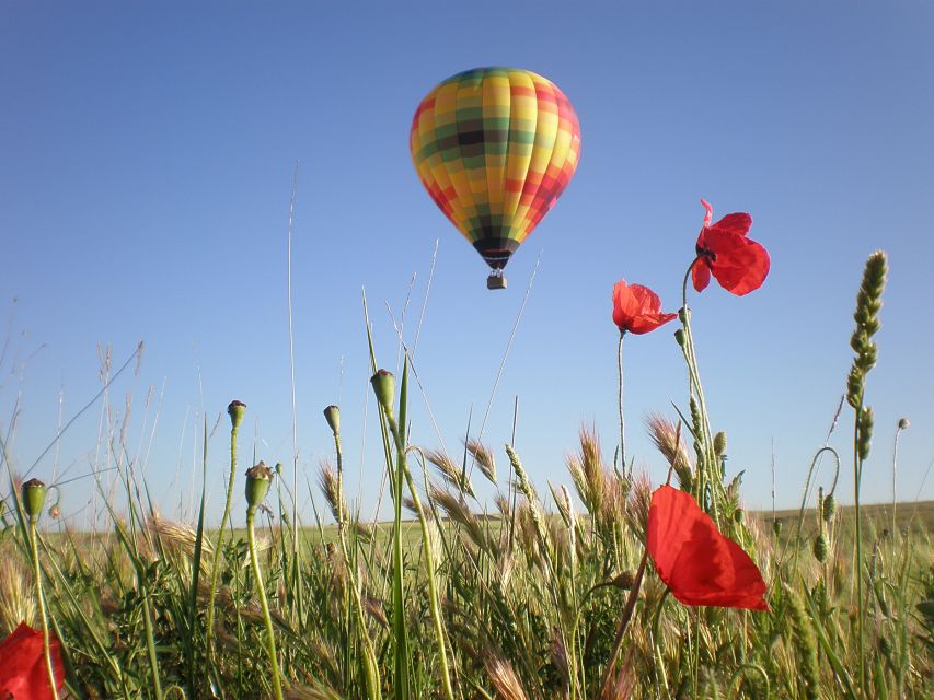 Segovia: Hot-Air Balloon Flight with Optional 3-Course Lunch - Arriving at the launch field near the hospital