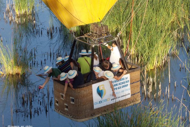 Seville Hot-Air Balloon Ride with Breakfast, Cava & Hotel Pick up - Watching the balloon come alive