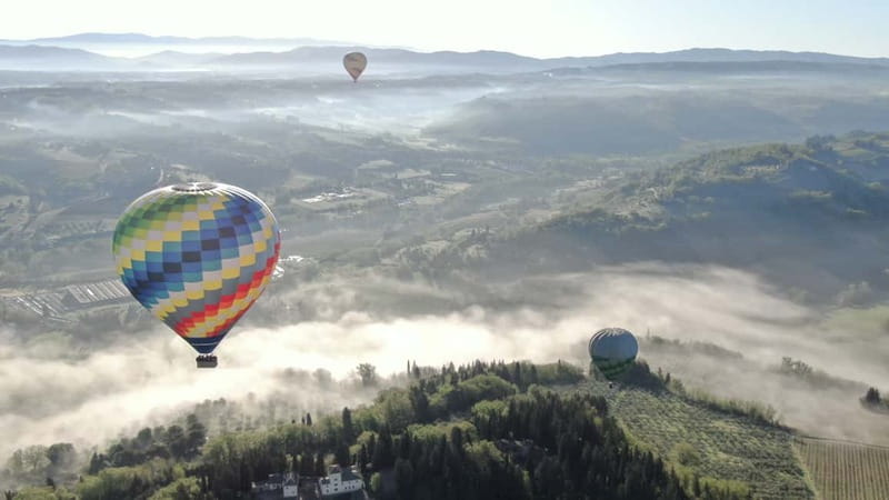 Siena: Balloon Flight Over Tuscany with a Glass of Wine - Preparing the balloon before takeoff