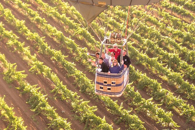 Sunrise Hot Air Balloon Flight over the Temecula Wine Country - The flight itself: quiet views and short bursts of flame
