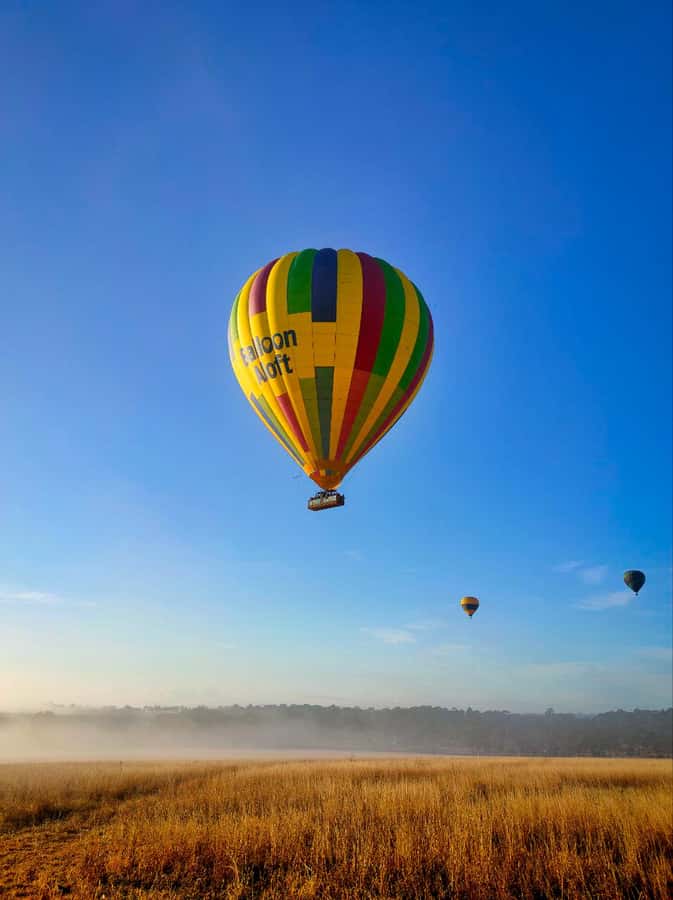Sydney: Hunter Valley Sunrise Balloon Flight with Transfer - Preparing the balloon in the Hunter Valley