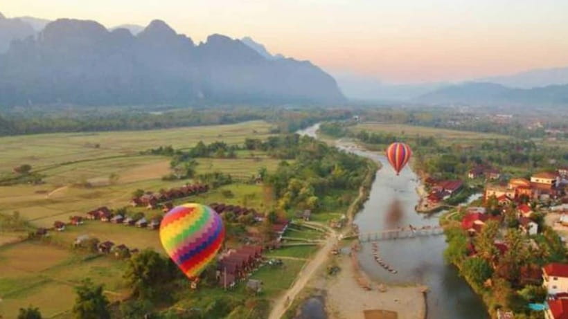 Vang Vieng: Hot Air Balloon Ride with City Hotel Pickup - Seeing Vang Vieng from the basket